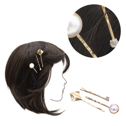 Set von drei Haarspangen aus goldenem Metall mit Strasssteinen und Perle 5cm